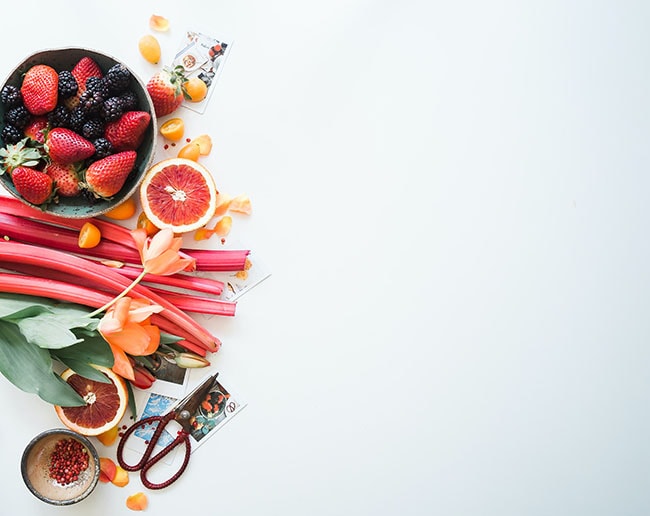 Picture of fruit in a bowl and on a white background